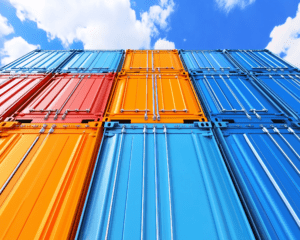 quietstorm22_A_row_of_shipping_containers_stacked_on_top_of_eac_148ee6b4-ff85-4778-8bea-330e7af0de5d